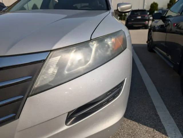 Before headlight restoration — hazy yellowed headlight